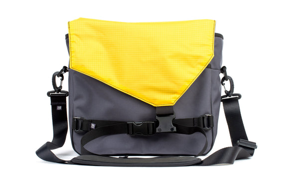 The Maker's Bag in Nebulous Grey (grey) Ballistic with Marigold (yellow) Cerylon interior.